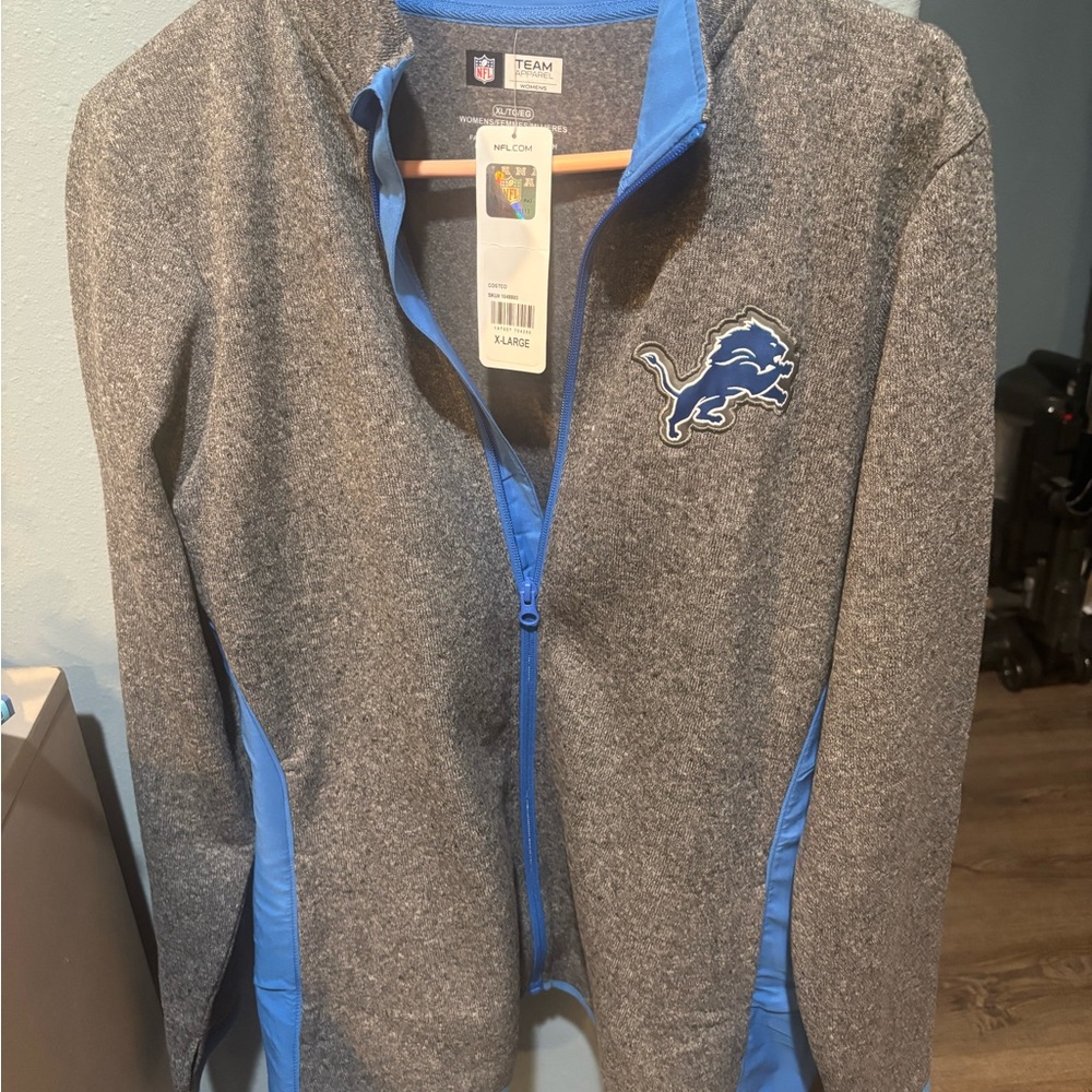 ***No longer Available —- NFL Team Apparel Gray and Blue Women's Jacket 1/2 Zip